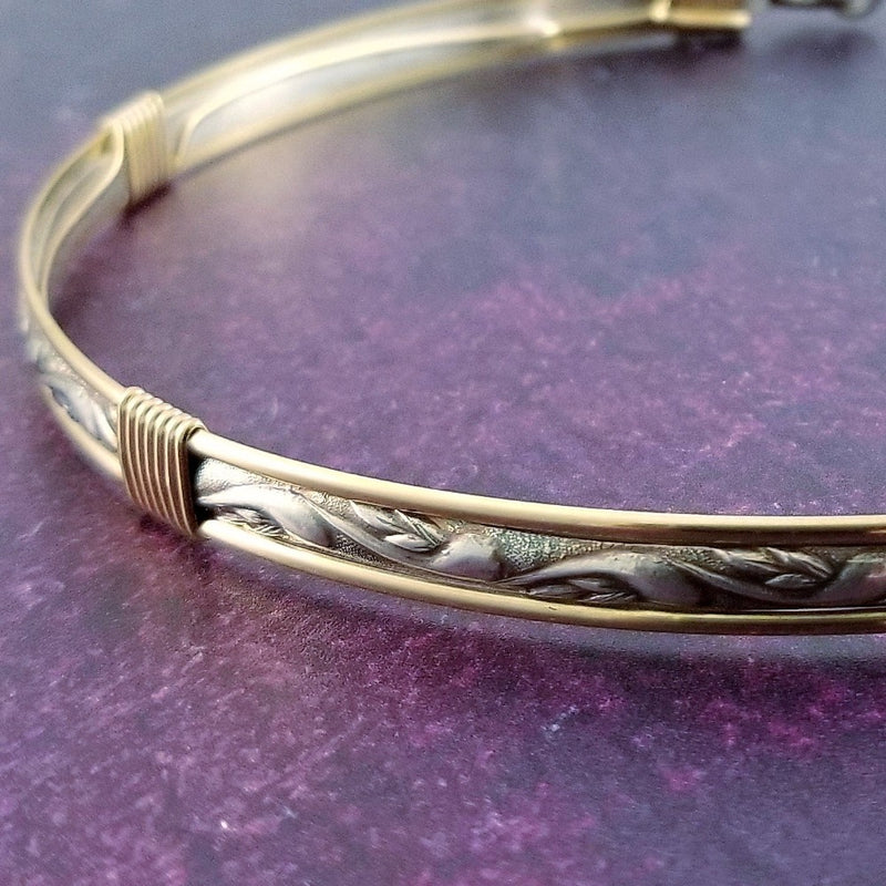 We've taken a fan favorite and revved it up with some gold accents. The 'INFATUATION' collection of submissive jewerly is sweetly feminine. Delicate with a soft flowing design that's perfect for todays sub, yet has a midieval touch to it. 