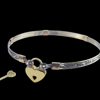 We've taken a fan favorite and revved it up with some gold accents. The 'INFATUATION' collection of submissive jewerly is sweetly feminine. Delicate with a soft flowing design that's perfect for todays sub, yet has a midieval touch to it. 