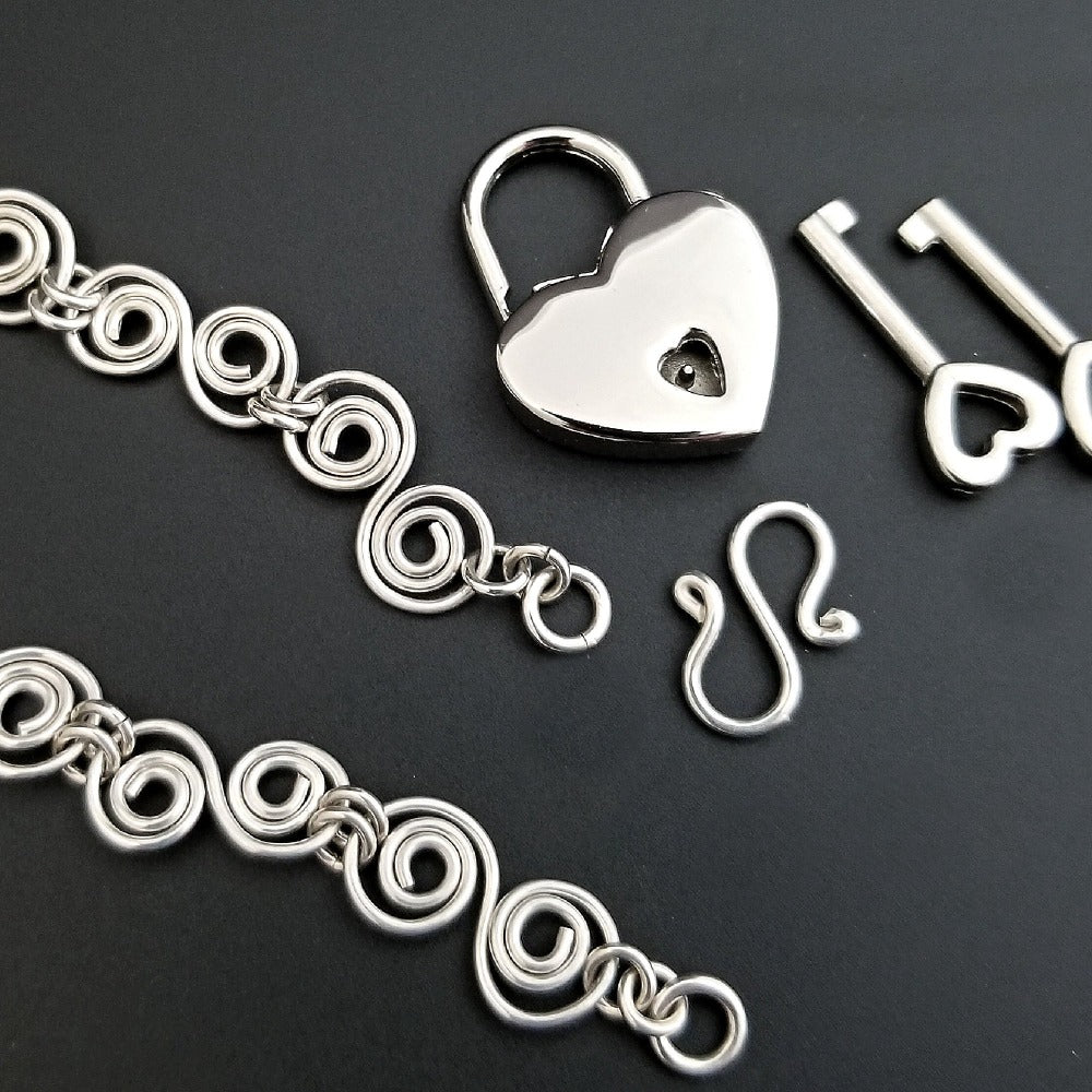 An infinity symbol is a universal statement of unending love. I believe those in a committed BDSM lifestyle know that our commitment is usually deeper and stronger than most traditional relationships. {Just my humble opinion, ;-D } These soft chain link collar is such a beautiful way to honor your power exchange or dynamic. This submissive collar can be worn locked, or with a traditional clasp for total discretion.