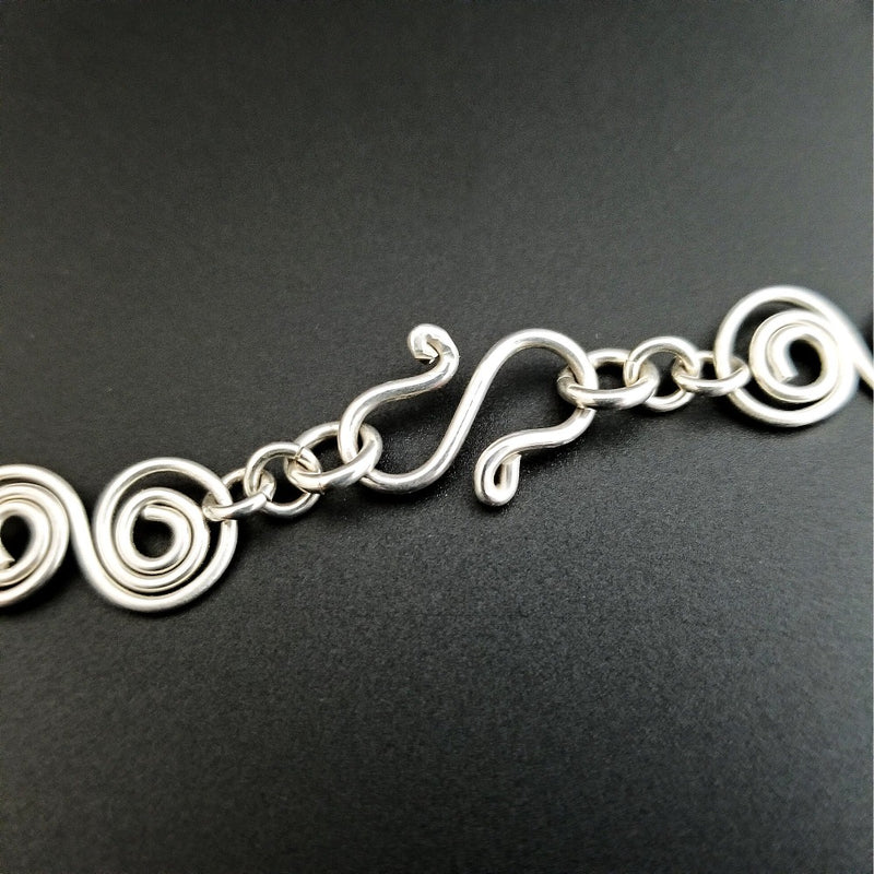 An infinity symbol is a universal statement of unending love. I believe those in a committed BDSM lifestyle know that our commitment is usually deeper and stronger than most traditional relationships. {Just my humble opinion, ;-D } These soft chain link collar is such a beautiful way to honor your power exchange or dynamic. This submissive collar can be worn locked, or with a traditional clasp for total discretion.
