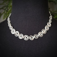 An infinity symbol is a universal statement of unending love. I believe those in a committed BDSM lifestyle know that our commitment is usually deeper and stronger than most traditional relationships. {Just my humble opinion, ;-D } These soft chain link collar is such a beautiful way to honor your power exchange or dynamic. This submissive collar can be worn locked, or with a traditional clasp for total discretion.
