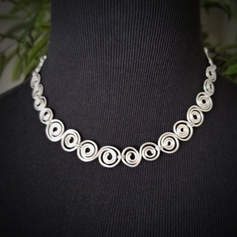 An infinity symbol is a universal statement of unending love. I believe those in a committed BDSM lifestyle know that our commitment is usually deeper and stronger than most traditional relationships. {Just my humble opinion, ;-D } These soft chain link collar is such a beautiful way to honor your power exchange or dynamic. This submissive collar can be worn locked, or with a traditional clasp for total discretion.