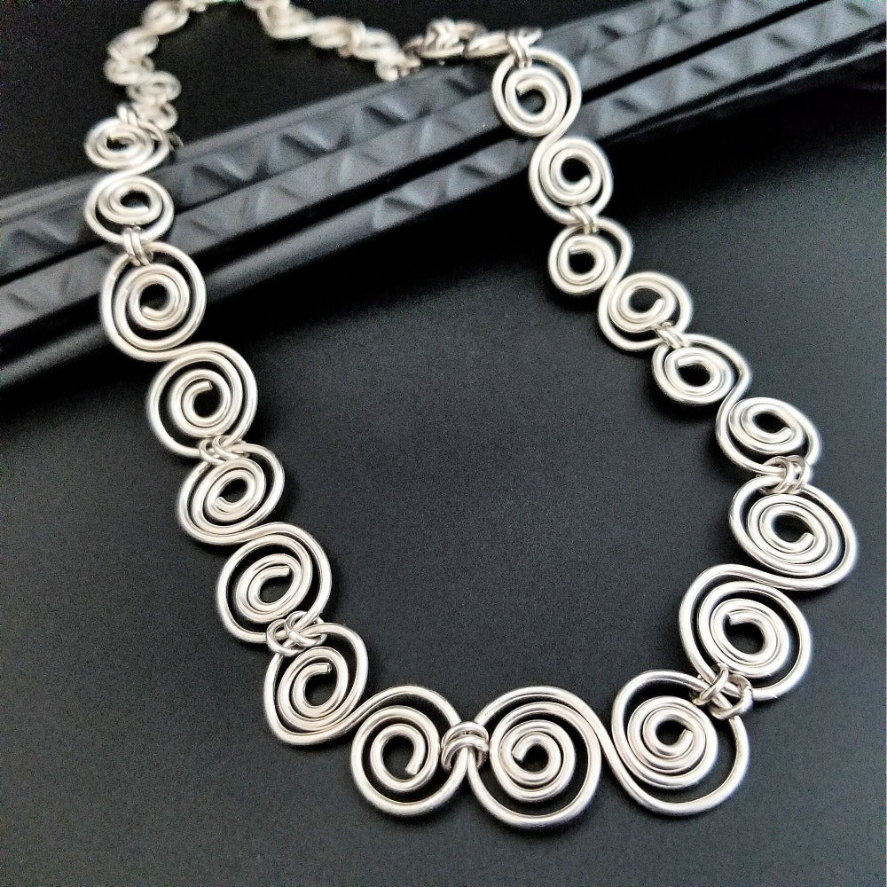 An infinity symbol is a universal statement of unending love. I believe those in a committed BDSM lifestyle know that our commitment is usually deeper and stronger than most traditional relationships. {Just my humble opinion, ;-D } These soft chain link collar is such a beautiful way to honor your power exchange or dynamic. This submissive collar can be worn locked, or with a traditional clasp for total discretion.