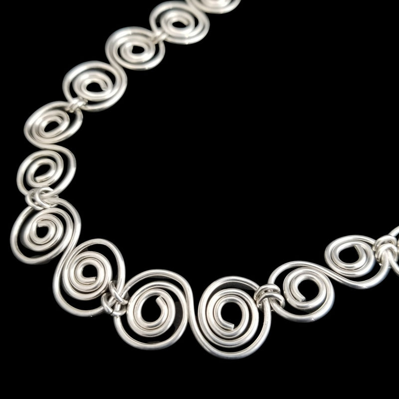 An infinity symbol is a universal statement of unending love. I believe those in a committed BDSM lifestyle know that our commitment is usually deeper and stronger than most traditional relationships. {Just my humble opinion, ;-D } These soft chain link collar is such a beautiful way to honor your power exchange or dynamic. This submissive collar can be worn locked, or with a traditional clasp for total discretion.