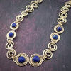These BDSM Soft Locking Infinity Collars are such a beautiful way to show and honor your D/s or M/s dynamic.  Featuring handcrafted Infinity links made of precious metals and embellished with gemstones. This submissive collar can be worn locked, or with a traditional clasp for total discretion.