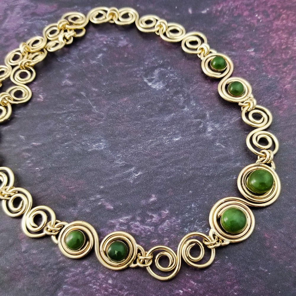 These BDSM Soft Locking Infinity Collars are such a beautiful way to show and honor your D/s or M/s dynamic.  Featuring handcrafted Infinity links made of precious metals and embellished with gemstones. This submissive collar can be worn locked, or with a traditional clasp for total discretion.