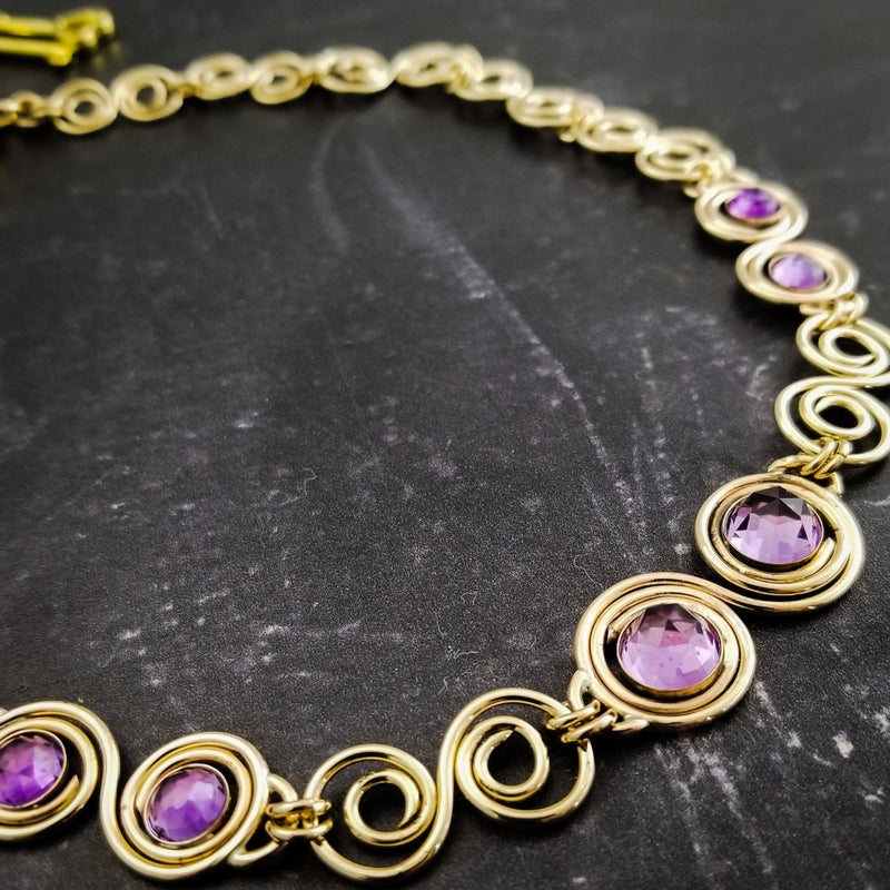 These BDSM Soft Locking Infinity Collars are such a beautiful way to show and honor your D/s or M/s dynamic.  Featuring handcrafted Infinity links made of precious metals and embellished with gemstones. This submissive collar can be worn locked, or with a traditional clasp for total discretion.