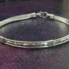 We've taken a fan favorite and revved it up with some silver accents. The 'INFATUATION' collection of submissive jewelry is sweetly feminine. Delicate with a soft flowing design that's perfect for todays sub, yet has a medieval touch to it. This submissive locking collar is hand crafted in a romantic floral pattern of solid sterling silver. A beautiful symbol of commitment or wedding gift.