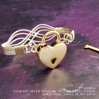 Symbolizes enduring love and commitment. Handcrafted in strands of both smooth and hand twisted precious metals. The bracelet can be locked for a beautifully discreet symbol of submission or ownership, or it can be created as a traditional bracelet.