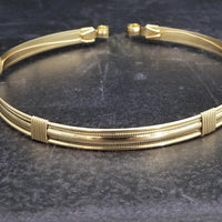 The Janus Submissive Collar is a locking collar made of luscious sterling silver with gleaming gold filled accents, so it's a statement of ownership, yet discreet enough to wear in the vanilla world. 