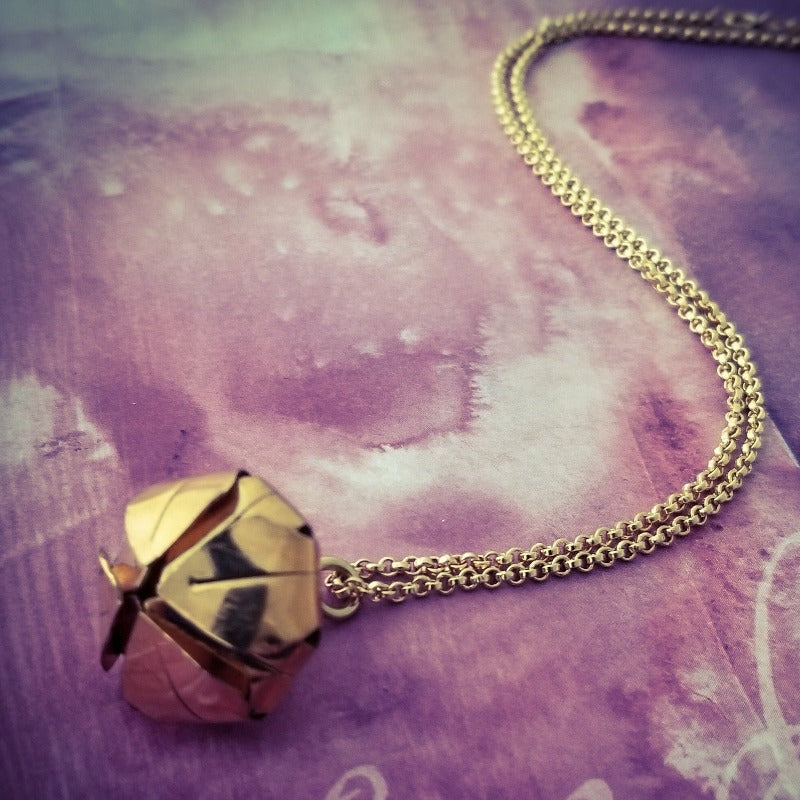 A locking submissive kitten bell collar, handcrafted crafted with all the grace and discretion that My Secret Heart is known for. This artisan bell is hand sawn from rose gold sheet, hammered and domed into an exquisite bell. Filled with stainless steel pellets for a delicate jingle.