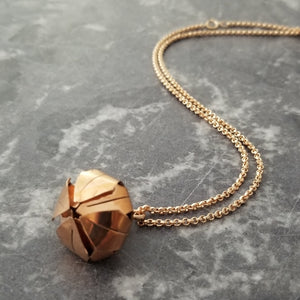 A locking submissive kitten bell collar, handcrafted crafted with all the grace and discretion that My Secret Heart is known for. This artisan bell is hand sawn from rose gold sheet, hammered and domed into an exquisite bell. Filled with stainless steel pellets for a delicate jingle.