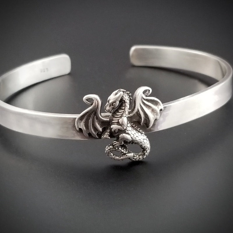 Beautifully crafted, our NIGHT WING DRAGON Classic Cuff Bracelet is sure to take your style to the next level! Crafted of genuine silver, this eye-catching piece will draw the admiration of everyone you meet. Are you ready to transform your style with a touch of dragon magic?