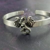 Beautifully crafted, our NIGHT WING DRAGON Classic Cuff Bracelet is sure to take your style to the next level! Crafted of genuine silver, this eye-catching piece will draw the admiration of everyone you meet. Are you ready to transform your style with a touch of dragon magic?
