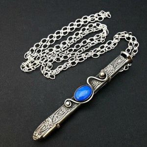An artisan gemstone necklace with a kinky secret!  The sterling silver pendant cages a sleek and sexy vibrator. So discreet, no one will ever guess. Think of all the fun you can have with this wicked little toy! 