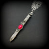 An artisan gemstone necklace with a kinky secret!  The sterling silver pendant cages a sleek and sexy vibrator. So discreet, no one will ever guess. Think of all the fun you can have with this wicked little toy! 