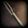 An artisan gemstone necklace with a kinky secret!  The sterling silver pendant cages a sleek and sexy vibrator. So discreet, no one will ever guess. Think of all the fun you can have with this wicked little toy!