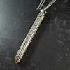 An artisan gemstone necklace with a kinky secret!  The sterling silver pendant cages a sleek and sexy vibrator. So discreet, no one will ever guess. Think of all the fun you can have with this wicked little toy!