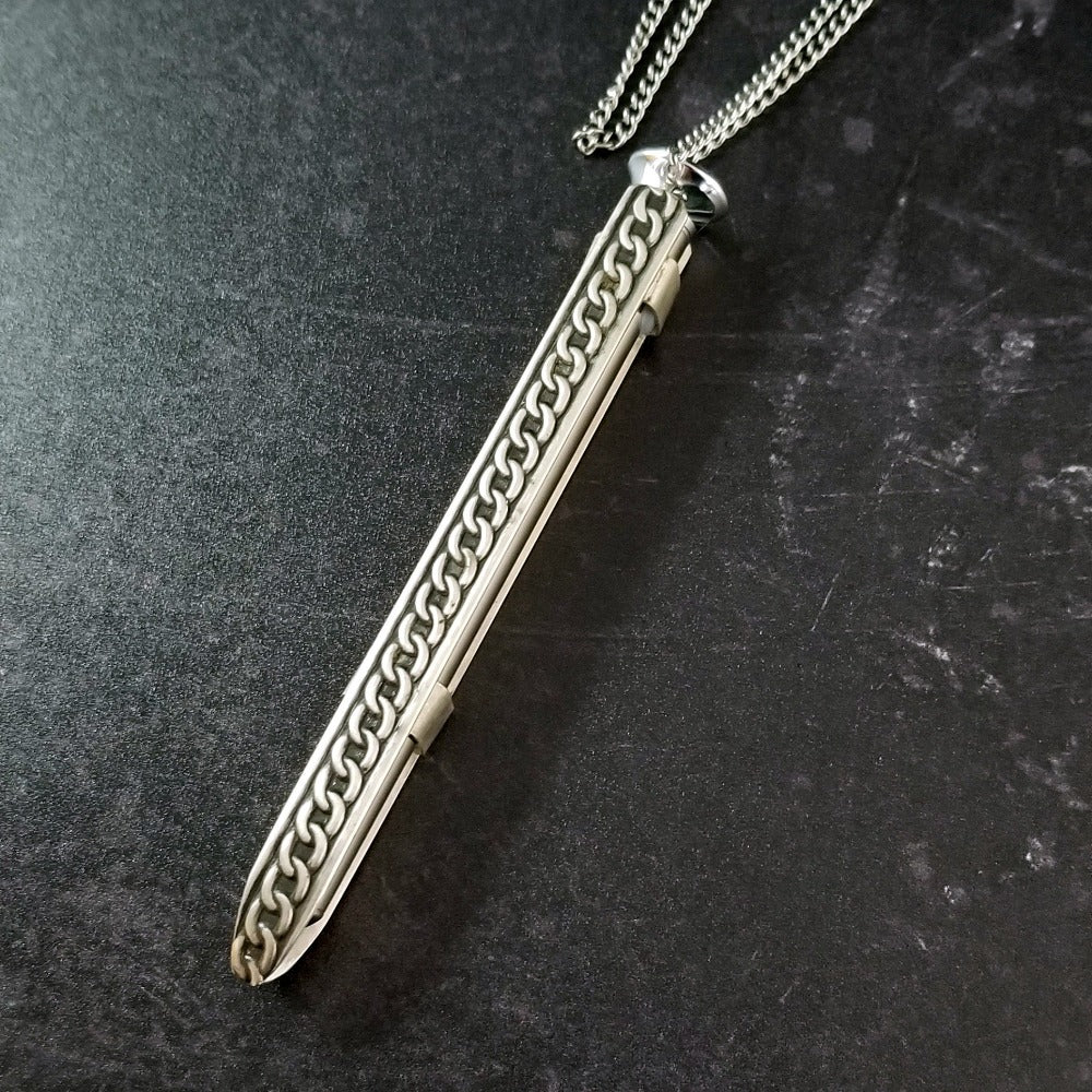 An artisan gemstone necklace with a kinky secret!  The sterling silver pendant cages a sleek and sexy vibrator. So discreet, no one will ever guess. Think of all the fun you can have with this wicked little toy!