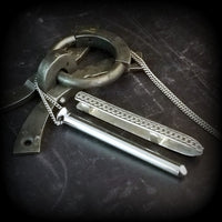 An artisan gemstone necklace with a kinky secret!  The sterling silver pendant cages a sleek and sexy vibrator. So discreet, no one will ever guess. Think of all the fun you can have with this wicked little toy!