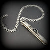 An artisan gemstone necklace with a kinky secret!  The sterling silver pendant cages a sleek and sexy vibrator. So discreet, no one will ever guess. Think of all the fun you can have with this wicked little toy! 