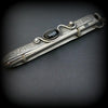 An artisan gemstone necklace with a kinky secret!  The sterling silver pendant cages a sleek and sexy vibrator. So discreet, no one will ever guess. Think of all the fun you can have with this wicked little toy! 