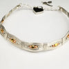 Bold and dramatic, and oh so sexy, this BDSM locking submissive collar will get plenty of attention. Yet it's so totally discreet, no one will ever know. Perfect statement of ownership for kittens, subs and slaves.   This wire wrapped collar is created in sterling silver, and has faceted sterling, 14k yellow and rose gold filled beads incorporated into the collar. With it's rounded, hand sculpted shape, this collar is very comfortable.   