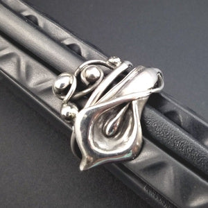 The Calla Lily Collection is a graceful addition to our artisan BDSM jewelry line. Graceful and feminine, this ring is the perfect compliment to our Calla Lily collars or bracelet.