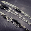 A BDSM gemstone necklace with a kinky secret. It holds a vibe! The ultimate luxury, this dark beauty pays homage to those dark, sensual moods.