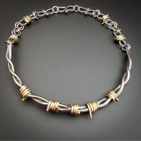 Our version of a Barbed Wire Collar, this beast is from our Brambles Collection, inspired by barbs, thorns and prickly things. This BDSM LOCKING SUBMISSIVE COLLAR is thick, hefty and truly badass. I create the barbs with comfort in mind, they're smooth and aren't long enough to do real damage, but still just a touch dangerous ;D