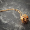 A locking submissive kitten bell collar, handcrafted crafted with all the grace and discretion that My Secret Heart is known for. This artisan bell is hand sawn from rose gold sheet, hammered and domed into an exquisite bell. Filled with stainless steel pellets for a delicate jingle.