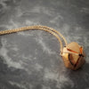A locking submissive kitten bell collar, handcrafted crafted with all the grace and discretion that My Secret Heart is known for. This artisan bell is hand sawn from rose gold sheet, hammered and domed into an exquisite bell. Filled with stainless steel pellets for a delicate jingle.