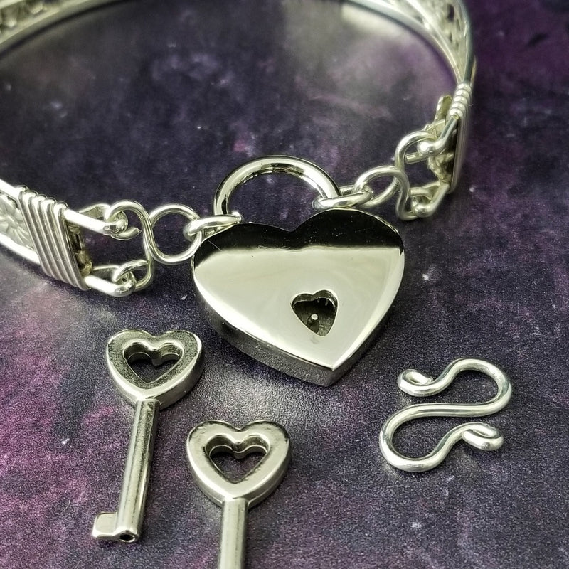 The Bel Fiore is one of our most delicate and feminine designs. Totally discreet. Can be locked for submission or show of Ownership, or worn with the traditional clasp for totally discreet wear.