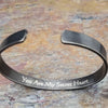 Share a secret. Ancient looking fonts create unique cuffs with a secret message. The outside inscription is Kanji symbols. Traditional Cuff with gap. All Sterling Silver, heavily oxidized. Message: You Are My Secret Heart