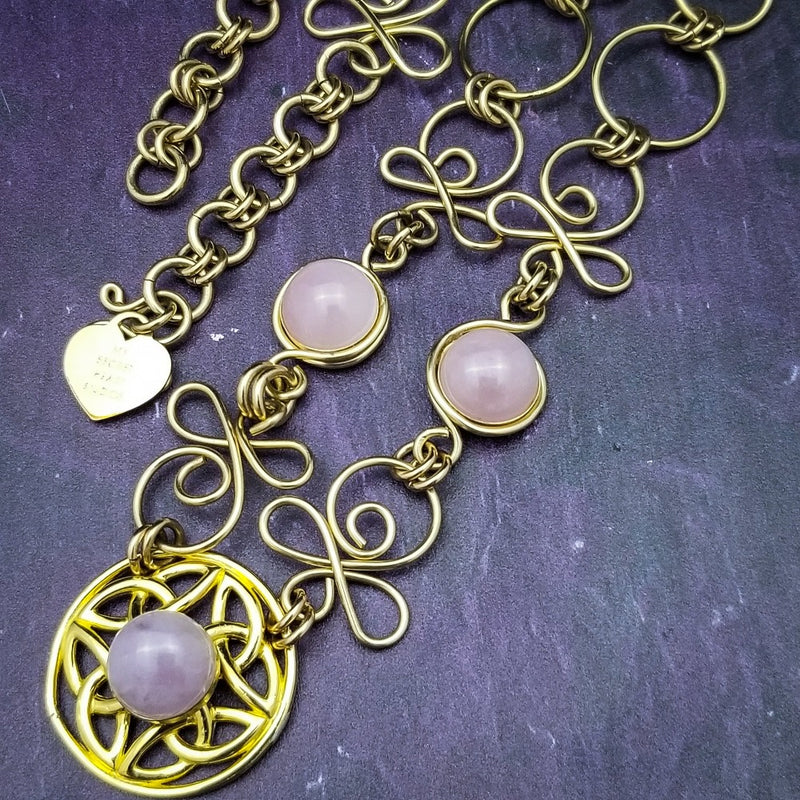 THE CELTIC PRIESTESS MEDALLION BELT features chain links inspired by Celtic knots, all created entirely by hand using luxurious 14K Gold Filled wire and hand selected gemstone cabochons.