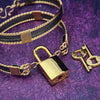 Wear the AMARI BDSM Submissive HANDCUFF BRACELETS / ANKLETS for an effortless, daring look. Crafted with a high-quality blend of blackened sterling silver and twisted gold, these bracelets or anklets will add a subtle touch of elegance to any outfit. Only you and yours will know it's a statement of Ownership.