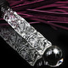 Get your kink on with this BDSM Flogger in Purple Leather and Glass. With a whip on one end and a glass dildo on the other, you’ll have the perfect balance between pleasure and pain! Can be Monogrammed / Engraved. By My Secret Heart Studios