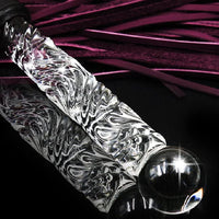 Get your kink on with this BDSM Flogger in Purple Leather and Glass. With a whip on one end and a glass dildo on the other, you’ll have the perfect balance between pleasure and pain! Can be Monogrammed / Engraved. By My Secret Heart Studios
