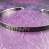 Share a secret. Rune font creates a unique collar with a secret message. The outside inscription is engraved in Rune symbols for Submissive, and the inside is engraved  with your choice of inscription