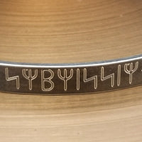 Share a secret. Rune font creates a unique collar with a secret message. The outside inscription is engraved in Rune symbols for Submissive, and the inside is engraved  with your choice of inscription