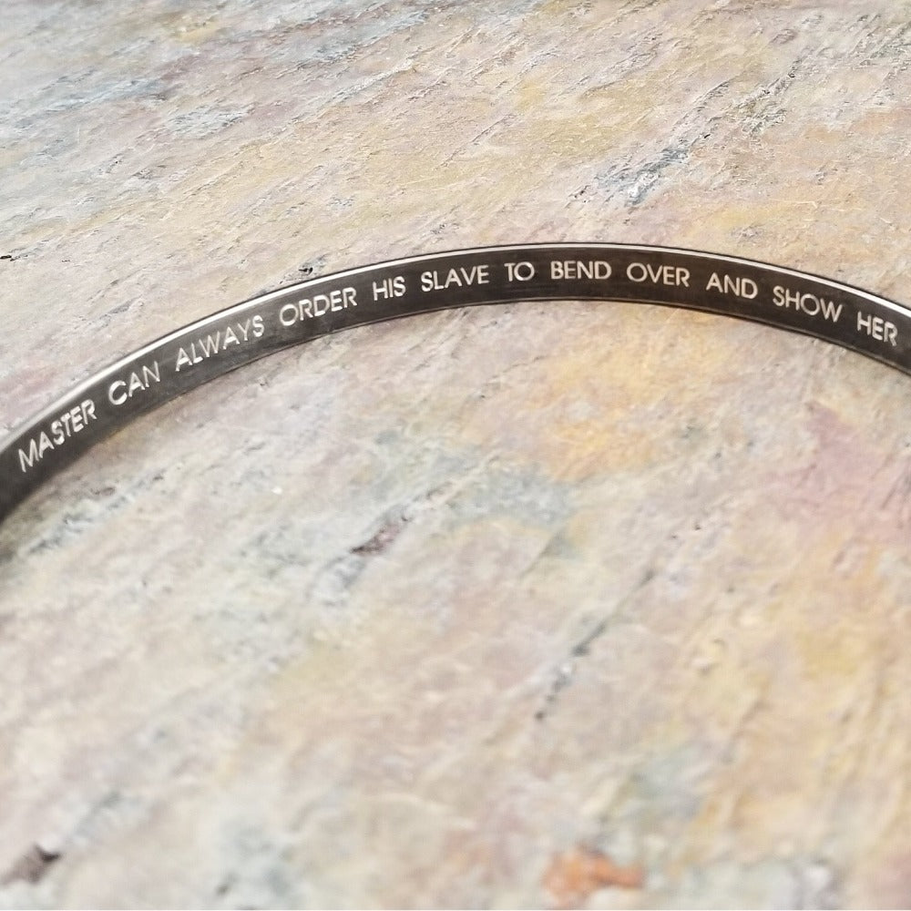 Share a secret. Rune font creates a unique collar with a secret message. The outside inscription is engraved in Rune symbols for Submissive, and the inside is engraved  with your choice of inscription