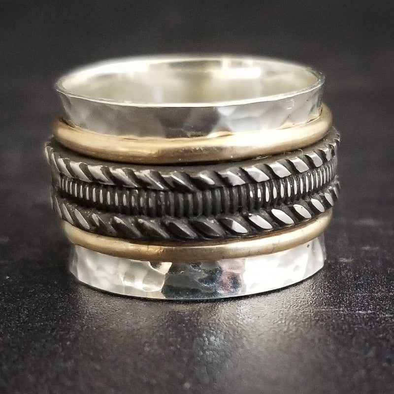 Our Rigger Collection is themed around ropes, paying homage to the ancient art of shibari. Created in sterling with slim bands of 14k gold filled accents.