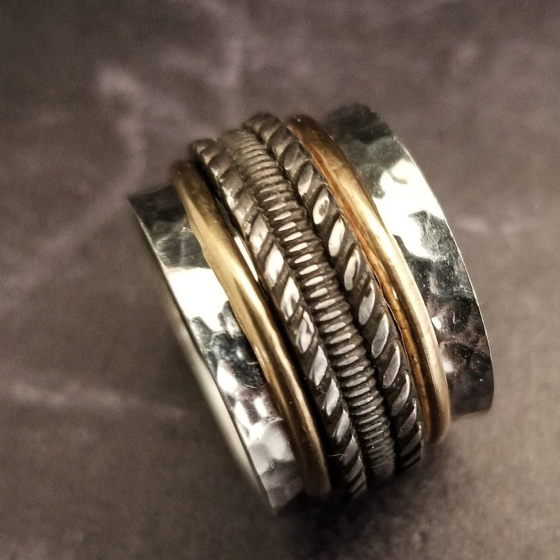 Our Rigger Collection is themed around ropes, paying homage to the ancient art of shibari. Created in sterling with slim bands of 14k gold filled accents.