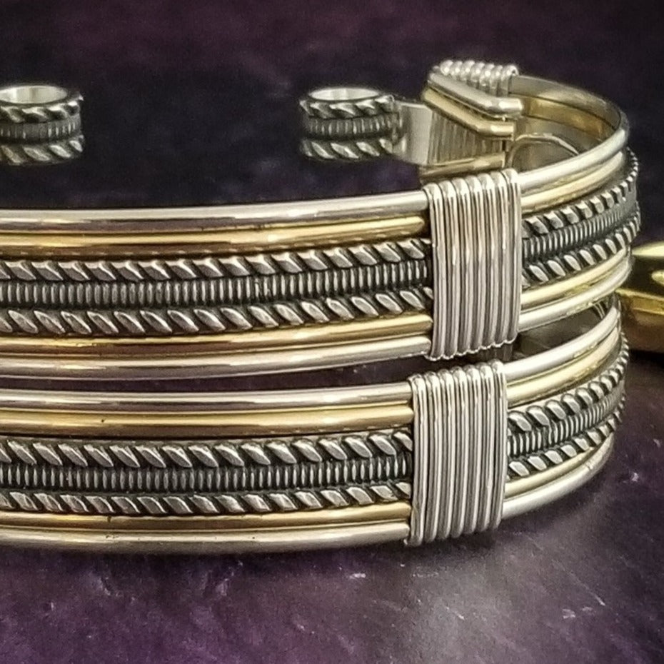 Our Rigger Collection is themed around ropes, paying homage to the ancient art of shibari. These locking BDSM submissive bracelets are so beautifully discreet.  Created in sterling with slim bands of 14k gold filled accents. Can be worn as wrist or ankle restraints. 