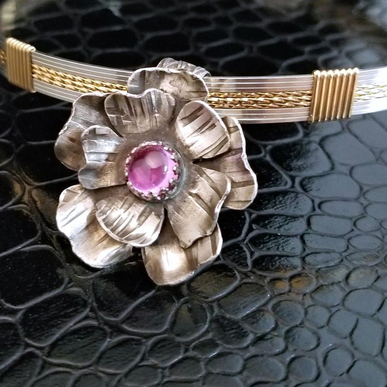 This beautiful handcrafted Rose of Aphrodite Collar Slide is made from sterling silver, it will symbolize love and beauty, but will also serve as a reminder of the strength and endurance of love.