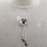 This Rose of Aphrodite necklace is so unique, no one will ever guess that it's a locked submissive collar. But both the Dominant and the submissive will enjoy the symbol of submission.