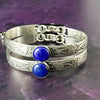 Silver and Lapis. What a luxurious way to show your Ownership / submission. Beautifully feminine and romantic locking handcuffs or anklets. This addition to our SOFT and SWEET Collection is created in precious metals and and all natural gemstones accented with coordinating wire accents. BDSM has never been so luxurious.