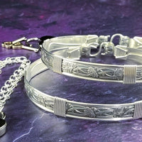 Our best-selling design ... Show your ownership/submission with style and grace. The Soft and Sweet Submissive Collection is the epitome of feminine beauty. This timeless floral pattern is solid sterling silver and hand wrapped with sterling silver accents. Worn as discreet, beautiful matching bracelets, no one will know your secret. 