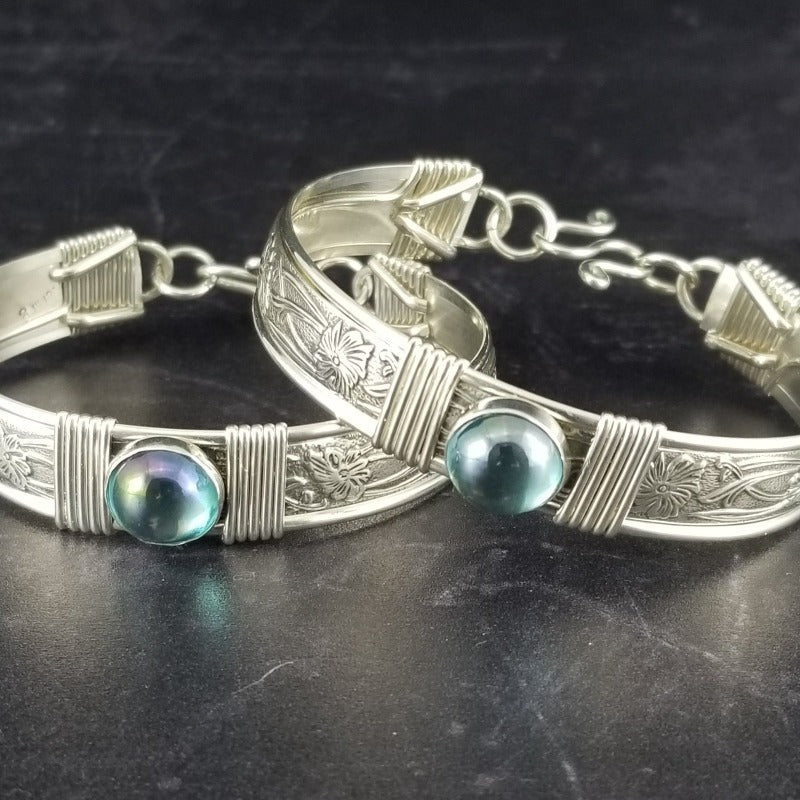 What a luxurious way to show your Ownership / submission. Beautifully feminine and romantic locking handcuffs or anklets. This addition to our SOFT and SWEET Collection is created in precious metals and and all natural gemstones accented with coordinating wire accents. BDSM has never been so luxurious.