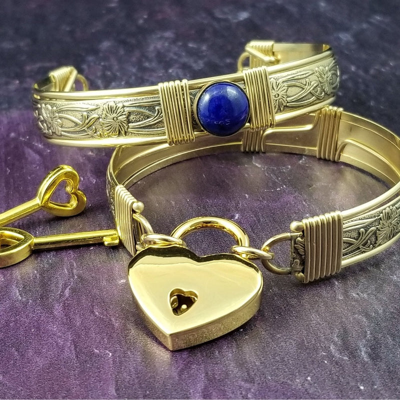 Gold and Lapis. What a luxurious way to show your Ownership / submission. Beautifully feminine and romantic locking handcuffs or anklets. This addition to our SOFT and SWEET Collection is created in precious metals and and all natural gemstones accented with coordinating wire accents. BDSM has never been so luxurious.